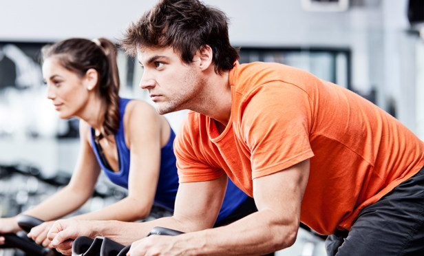 Finlake Gym Man & Women in Spin Class 